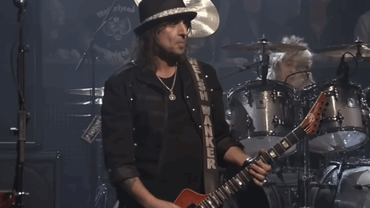 Phil Campbell playing a gibson Explorer