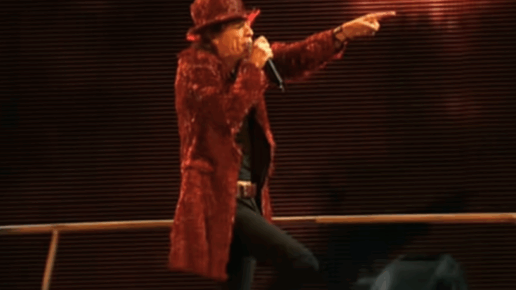 Mick Jagger playing on stage.