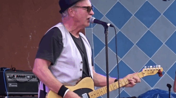 Tommy Tutone playing his telecaster guitar.