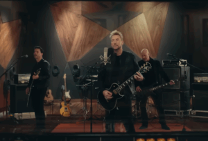 Watch Nickelback Team Up With Pop Star for Unexpected Song About Puffed Corn Snacks