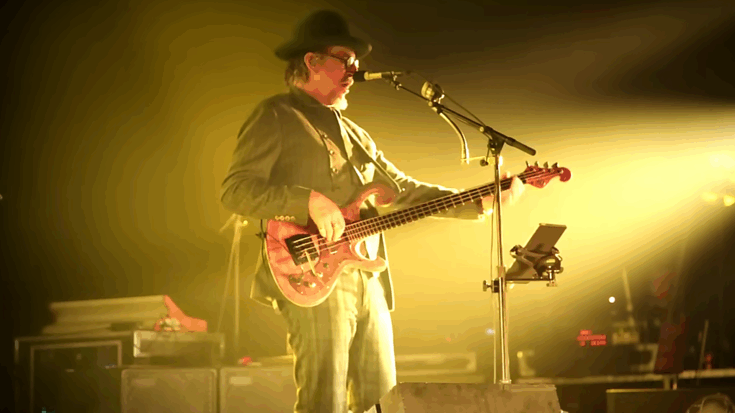 Les Claypool commands the stage with his Fender Jazz Bass, blending funky grooves and wild vocals into an electrifying performance.