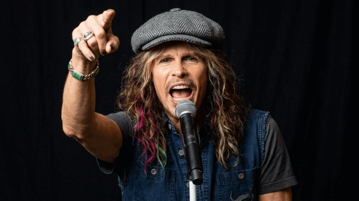 Steven Tyler with a Brian Johnson attire
